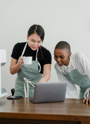 two girls on laptop